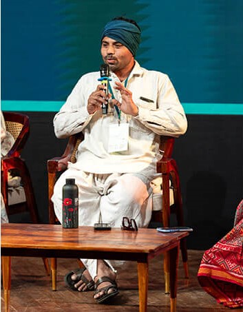 Craftsperson Dinesh at the Seamless Economy panel.