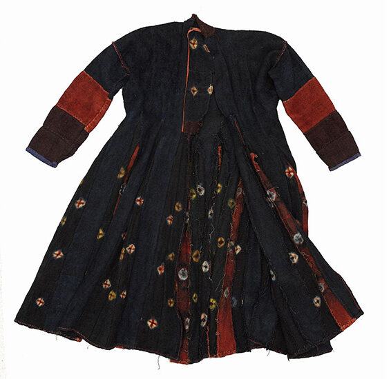 20th-century coat from Zanskar, Ladakh, crafted with narrow triangular panels of thigma dyed wool.