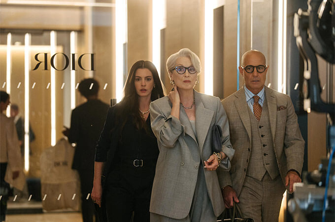Tucci as Nigel stands out for his impeccable dress and demeanour